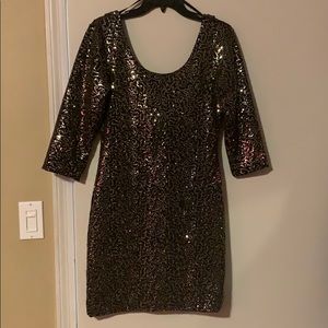 Black and gold sequin dress